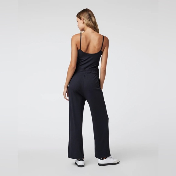 new Vuori Pose Henley ribbed jumpsuit in black stretch - Picture 2 of 8
